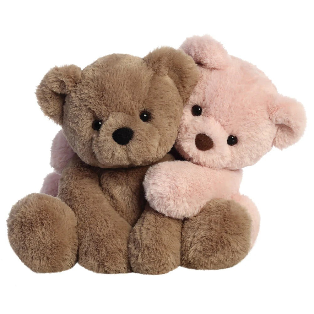 Both the dusty pink avery bear and taupe avery bear hugging, front profile.