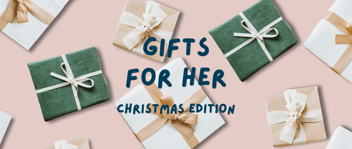 Text: Gifts for Her Christmas Edition. Image: Wrapped presents dotted across the page with a light pink background