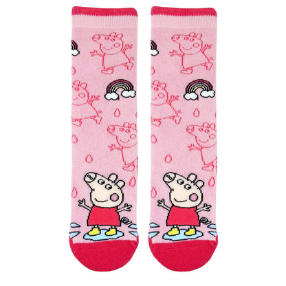 Peppa pig on a welly sock with 3 other outlined peppas in the background