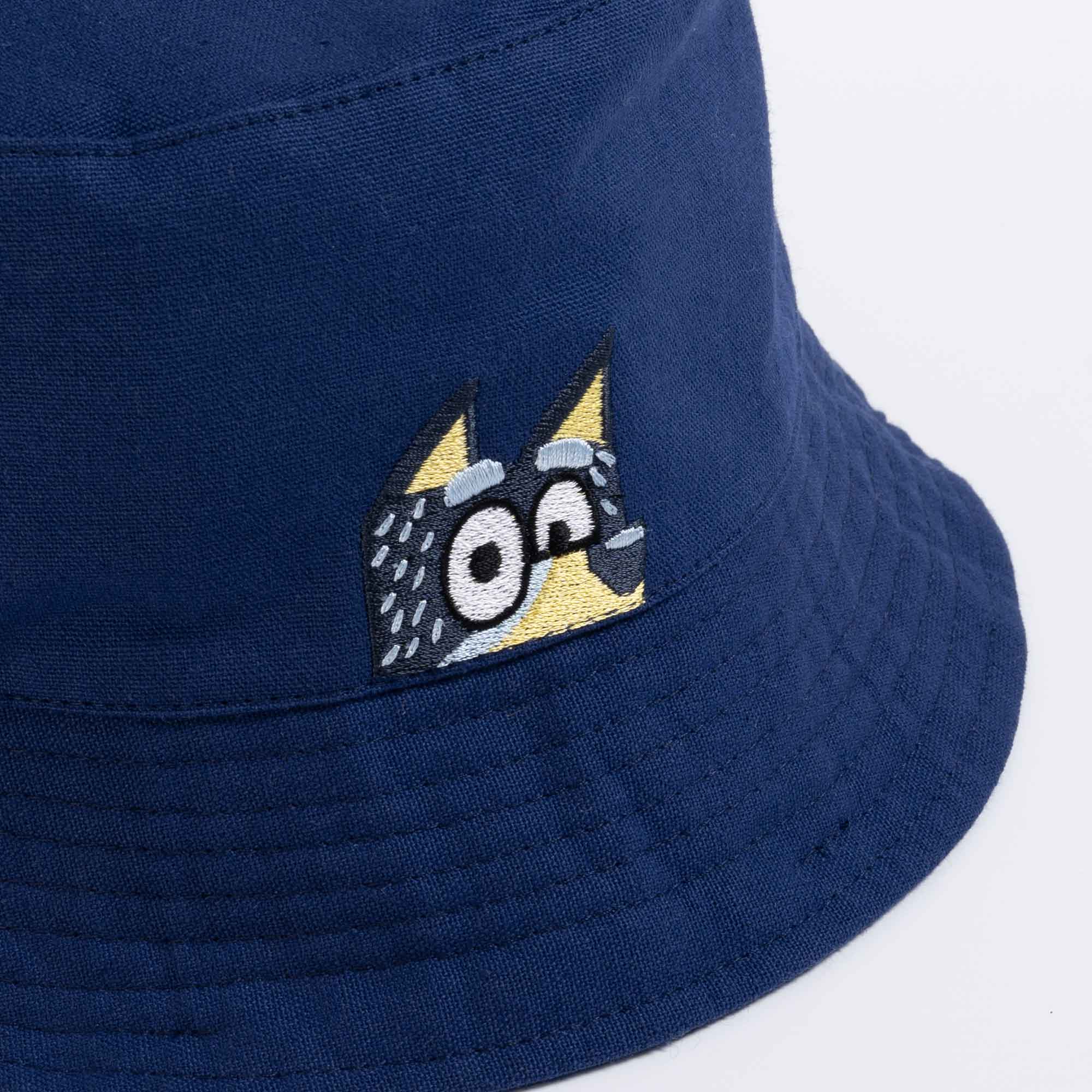 Side profile zoomed in close up of bandit embroidery located at the front of the bucket hat