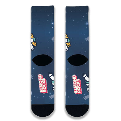 Back view of navy space-themed novelty socks continuing the star and galaxy pattern across the heel and ankle.