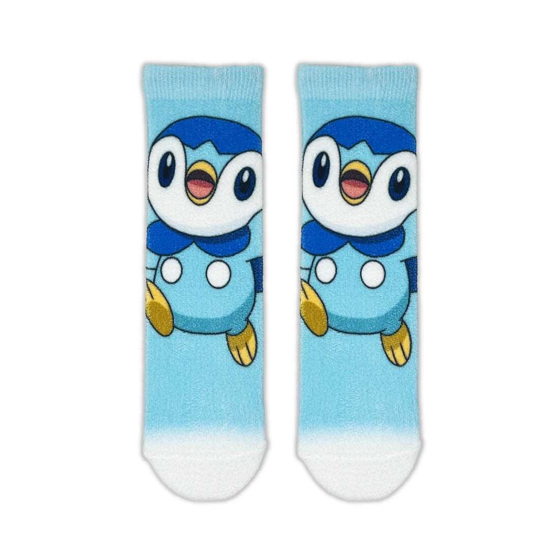 A pair of crew socks featuring Piplup on a light blue background with white toes, shown against a plain white background.