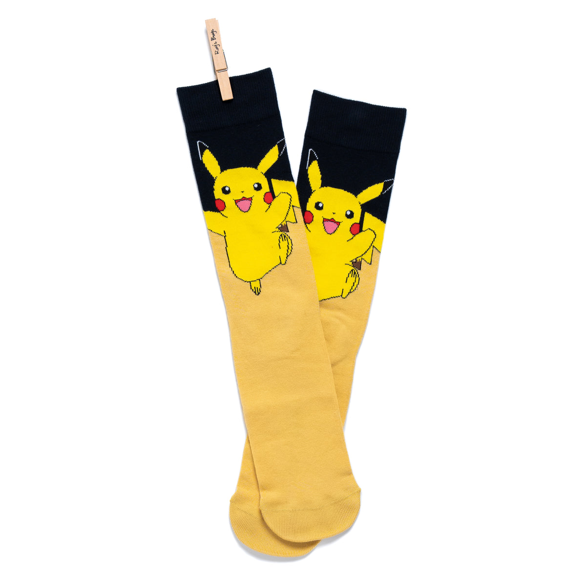 A pair of adult sized Pikachu socks. Black at the top and yellow from half way down and a character model on top. with the wooden Roy&